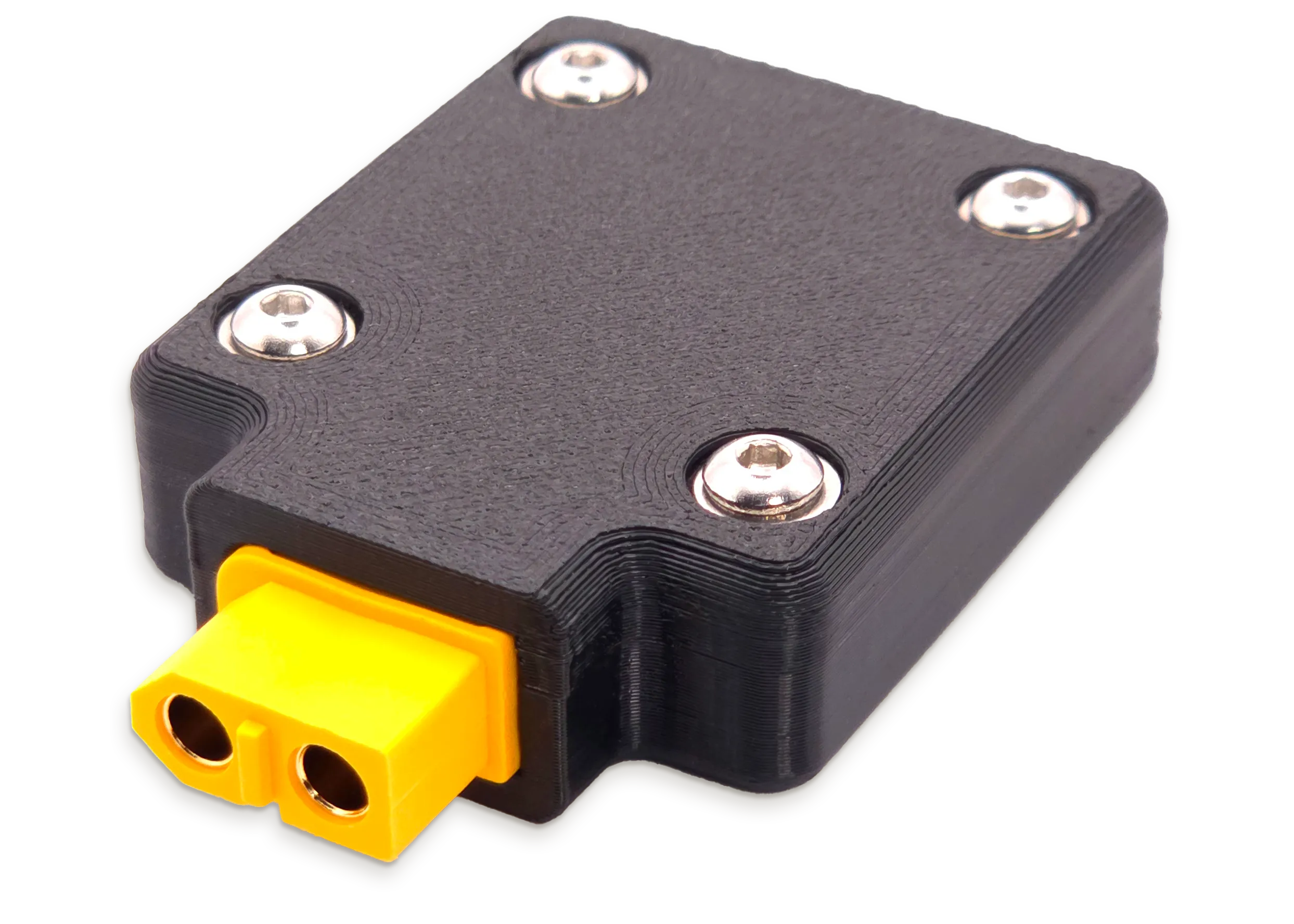 The XTC Juicebox: a matte black 3D-printed adapter about the size of a matchbox, four hex screws on its face, with a yellow genuine Amass XT60 connector on one end.